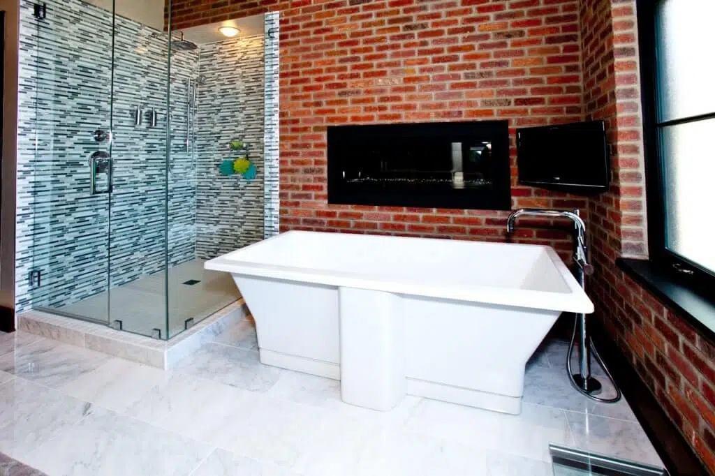 This frameless glass shower resides in one of our favorite bathroom projects by C&T designer Jenny.