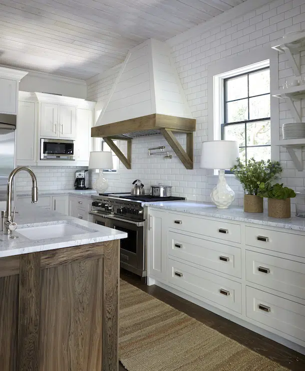 Elegantly rustic beach house kitchen by Tracery Interiors.