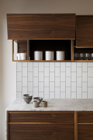 White subway tile with dark grout in a vertical pattern. Image via WS Workshop http://www.wsworkshop.com.au/indoor-modular-kitchens-03.html