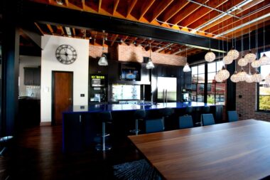 Espresso cabinetry with blue countertops 