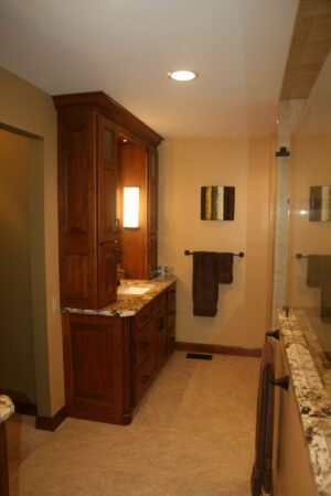 Tall tower flanking the vanity adds great detail and storage options 