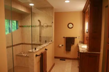 Sunset Hills Master Bathroom with walk in shower with granite bench seat