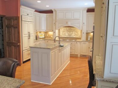Tiered island for raised dishwasher 