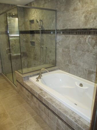 Drop in acrylic tub with grab bars 
