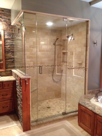 Frameless steam shower with soffit 