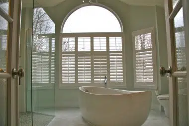 Freestanding tub in transitional setting 