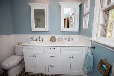 Beautiful white double vanity with matching individual medicine cabinets 
