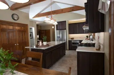 Traditional Kitchen with exposed beams on the ceiling 
