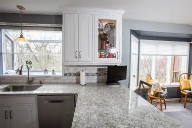 Texture glass inserts adds interest to any kitchen